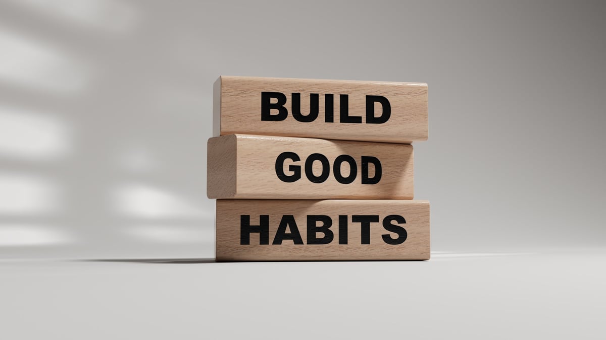 Wooden blocks spelling the words build good habits